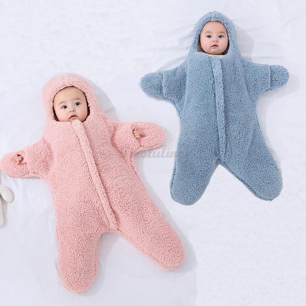 These snuggly fuzzy warm baby outfits have little hand openings and come in both pink and blue colors in a variety of sizes!